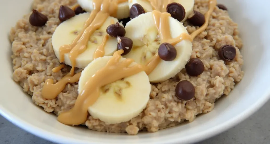 Chocolate peanut butter overnight oats with banana slices and chocolate chips