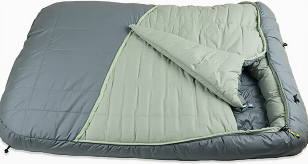 Kelty Tru.Comfort Doublewide Sleeping Bag with adjustable double-layer blanket system and zippered vents.